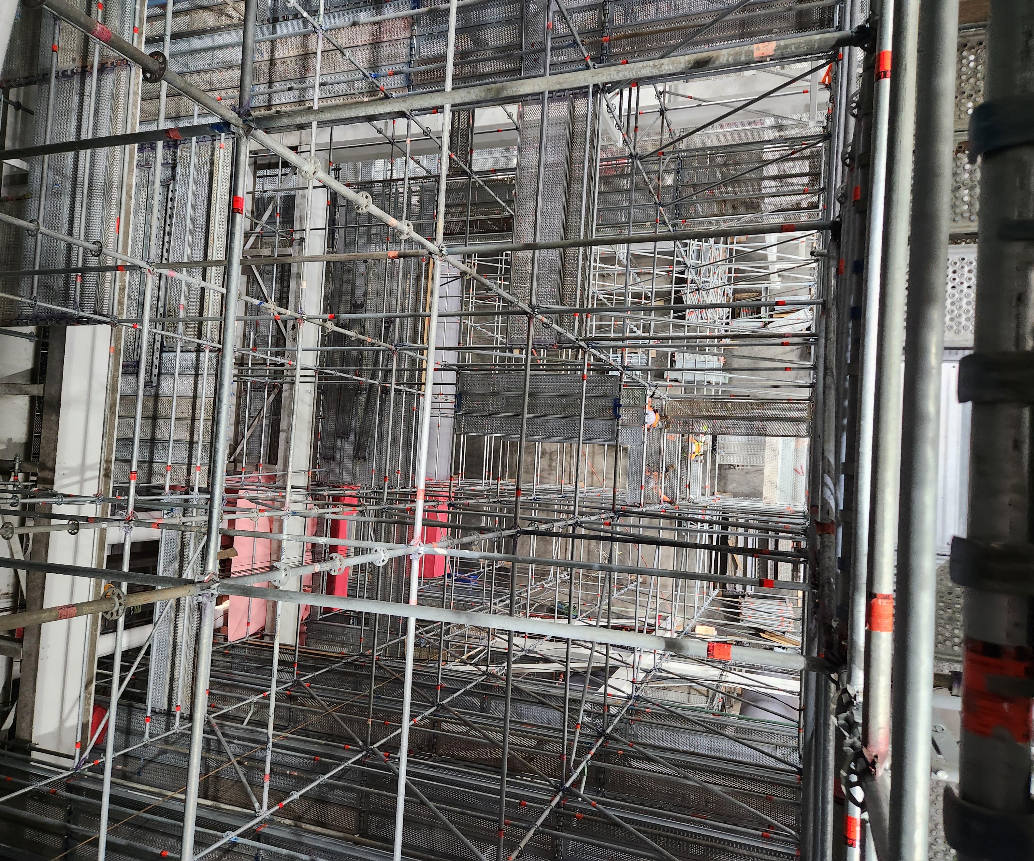 Overhead view of scaffold deck platforms and access framing